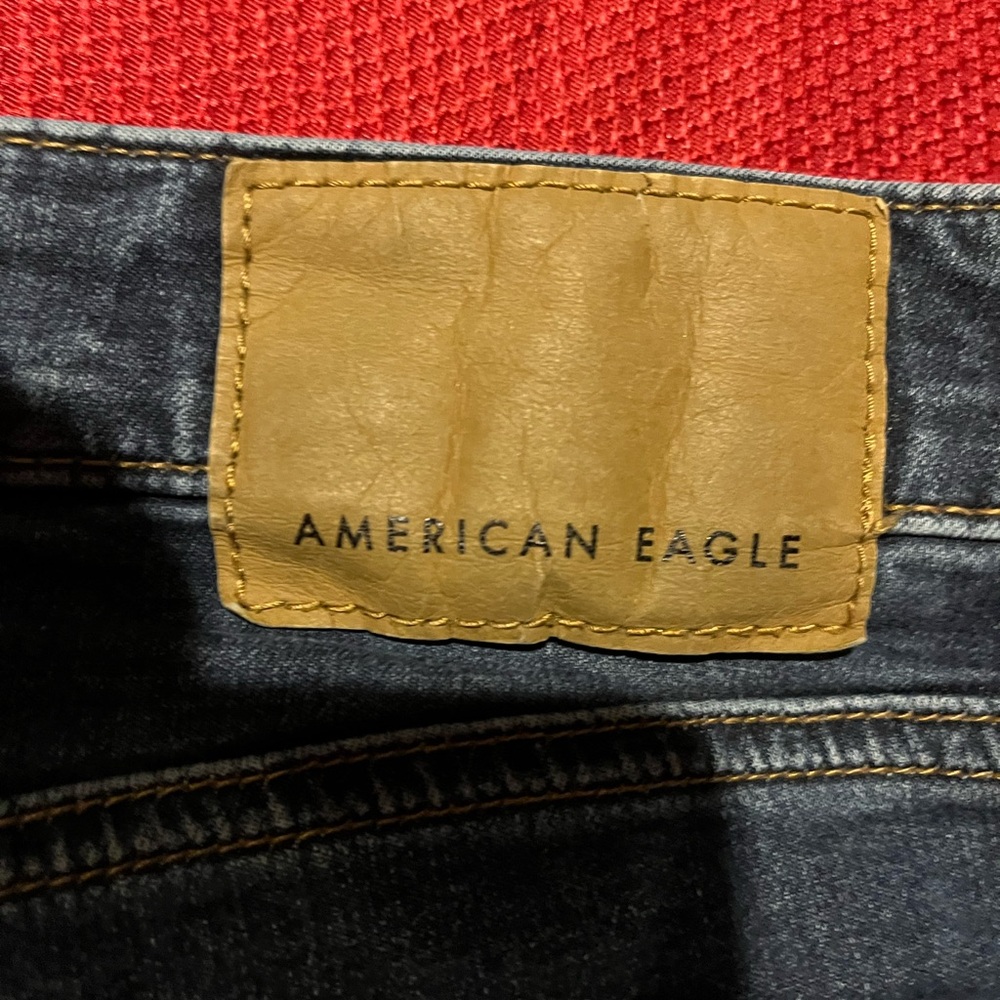 American Eagle Outfitters Dark Blue Jeans with Tan Patch
